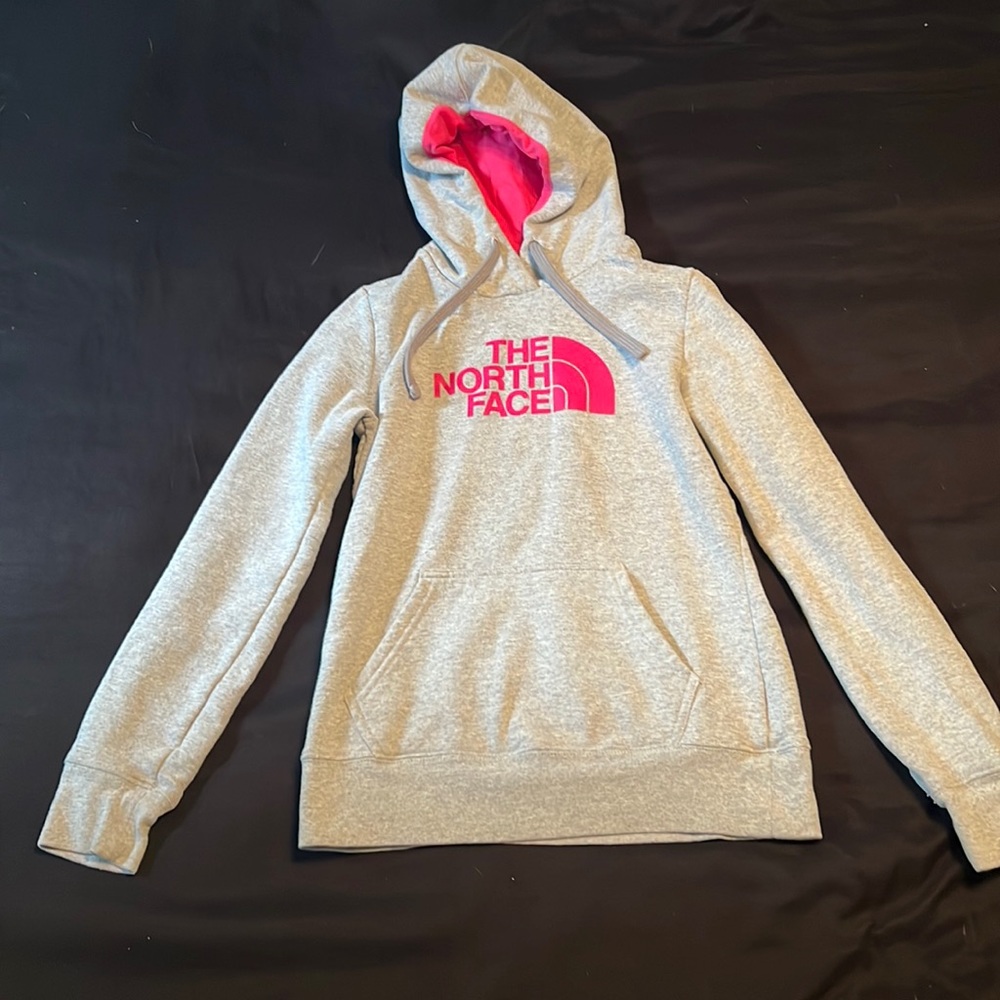 The North Face hooded sweatshirt size small.
